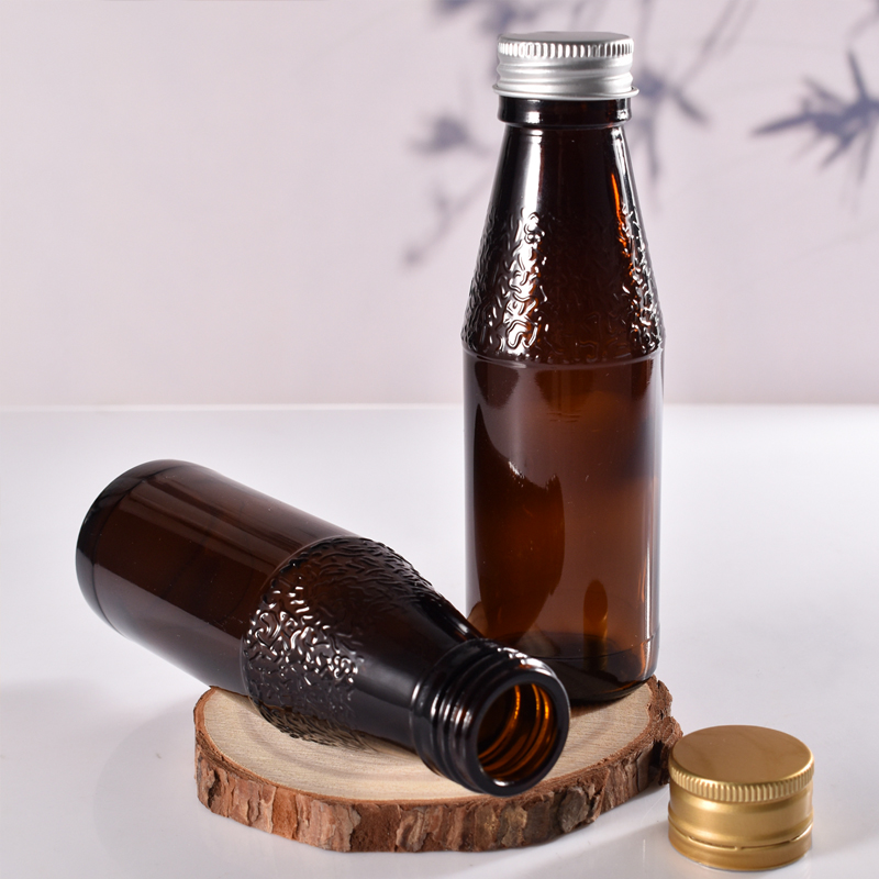 O vidro selado 100ml do fabricante recicla garrafas de xarope de vidro âmbar com tampa de metal