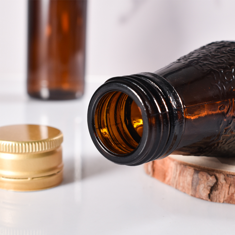 O vidro selado 100ml do fabricante recicla garrafas de xarope de vidro âmbar com tampa de metal