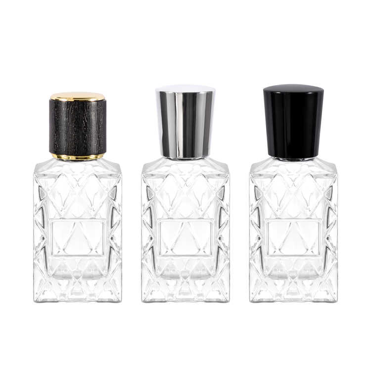 Frasco de perfume de vidro luxuoso em relevo de 30ml com tampa preta - embalagem de frasco de fragrância transparente personalizada